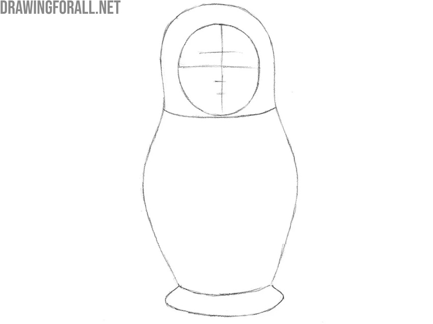 Mark the doll’s facial symmetry lines