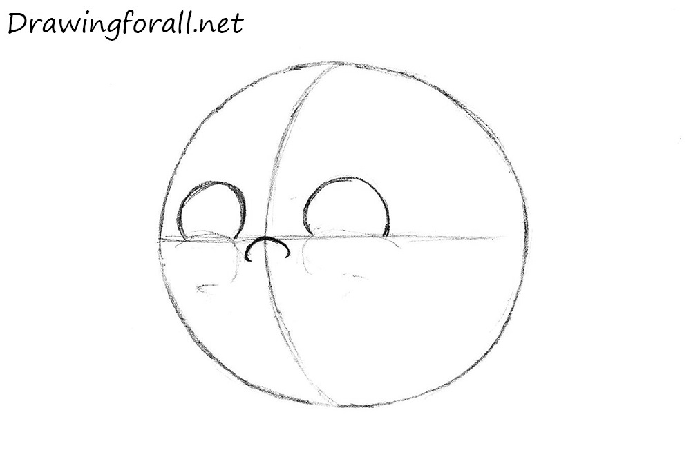 Drawing Kolobok's oval eyes and small nose over the guidelines