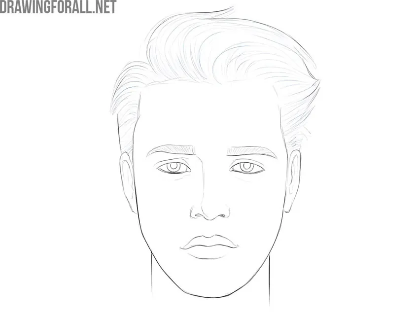 Refining the boy’s facial features and removing construction lines