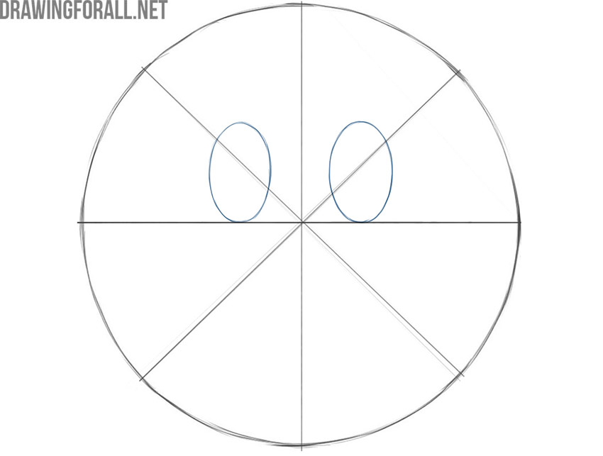 Adding two vertical oval eyes inside the smiley face